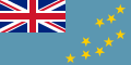 Navy Blue flag with Union Flag as top-left quarter and crest on right side.